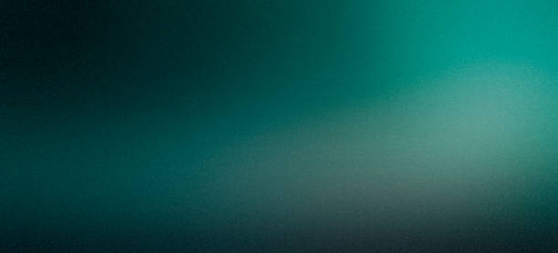 istock White green blurred gradient on dark grainy background, glowing light spot, copy space 1487940135