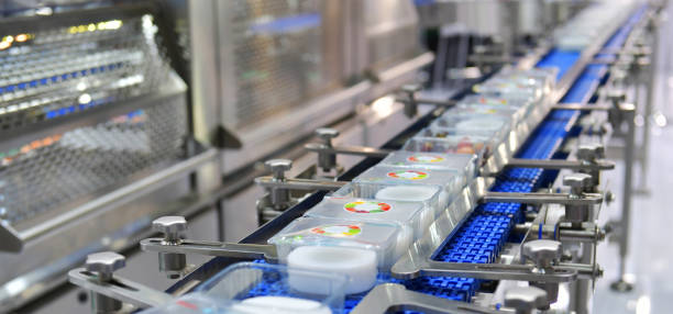 istock Food products box transfer on Automated conveyor systems industrial 1487943267