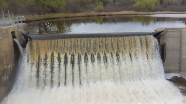 istock waterfall on a Canadian river in Quebec in the spring 1487947886