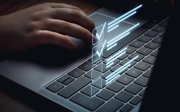 Woman use laptop marking check boxes. Successful completion of business tasks.