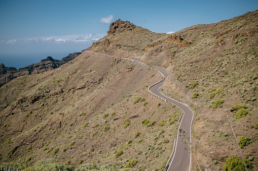 A scenic view of an empty winding country road, La Gomera, Canary Islands, Spain