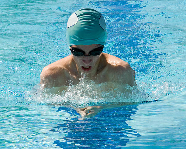 istock Teenage boy swimming breaststroke 148794990