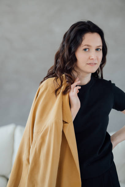 istock woman in yellow jacket 1487952296