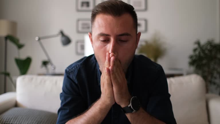 Man sit on sofa feels unhappy due personal life troubles