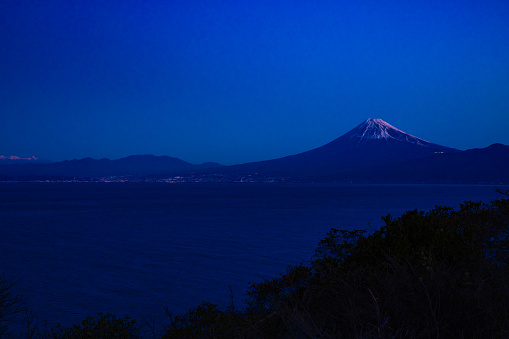 A dawn landscape of Mt Fuji near Suruga coast in Shizuoka. High quality photo. Numazu district Heda Shizuoka Japan 01.26.2023