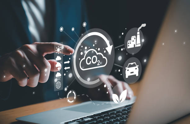 istock Entrepreneur hand point at digital screen dashboard while control and reduce carbon emission for global friendly business. Business with environment concern, carbon credit and zero emission. 1487969719