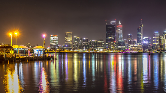 Long exposure Perth City Scape nighttime from the harbor view, night light panorama scene in low light.