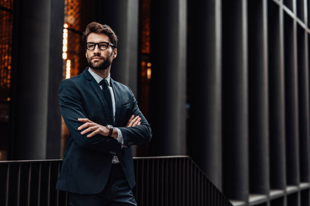 istock Smiling man outdoors in the city 1487970049
