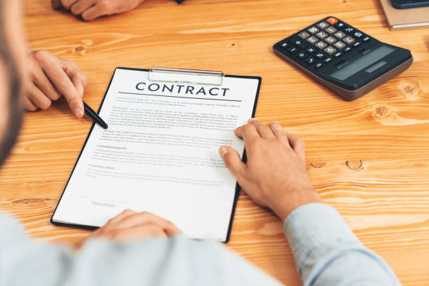 istock Businessman calculate finances and analyzing interest rate for client. Entity 1487974266
