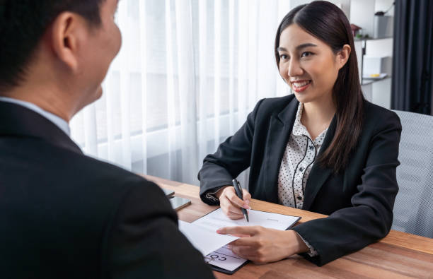 istock Businessman review agreement document before signing contract. Jubilant 1487975659