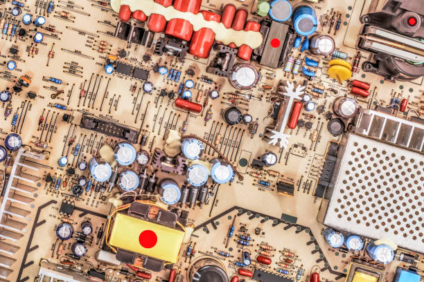Photograph of vintage electronic board multicolored detail, viewed directly above.