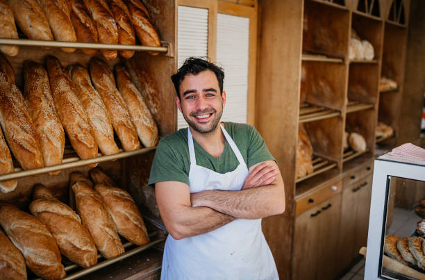 istock Portrait of a man working in bakery 1487993078