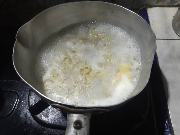 istock instant noodles being boiled with boiling water in a pot 1487993224