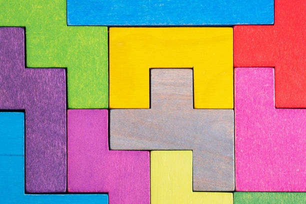 istock Abstract Background. Background with different colorful shapes wooden blocks 1487993355