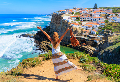 Azenhas do Mar, feliz mujer turista en Sintra, Portugal photo