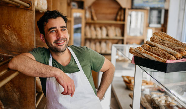 istock Bread seller at the bakery shop 1487994456
