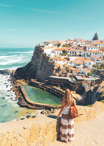 Azenhas do Mar, happy woman tourist in Sintra, Portugal