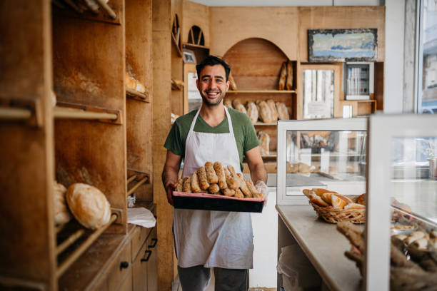istock Bread seller at the bakery shop 1487994692