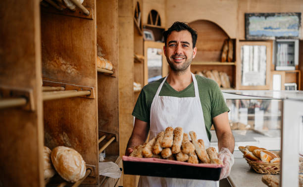 istock Bread seller at the bakery shop 1487994768