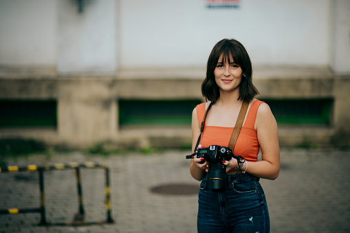 Women Photographer on the street in summer