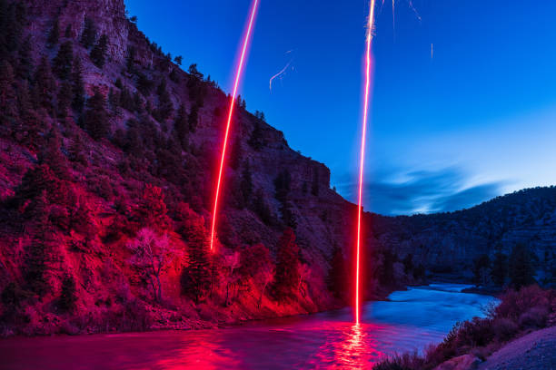 Night River Landscape with Red Lights - Creative light effect during blue hour.