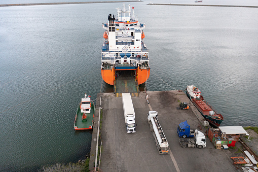 Shipping and Trucking Transportation - RO-RO Transport (Roll On/Roll Off). Aerial view.