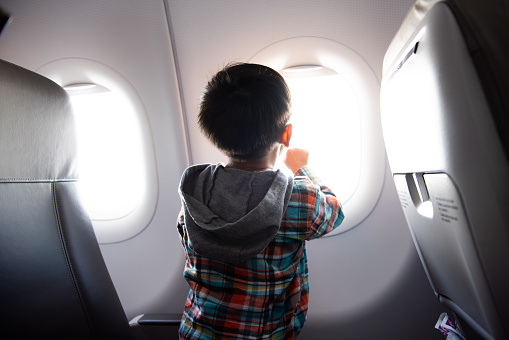Child traveling on a plane