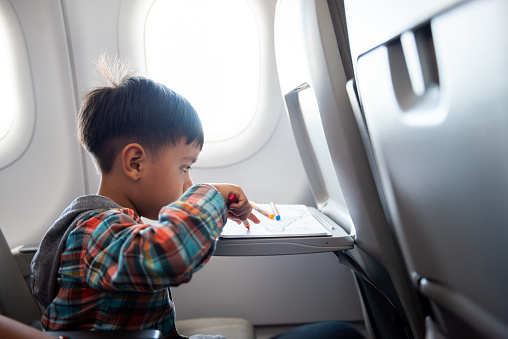 Child traveling on a plane