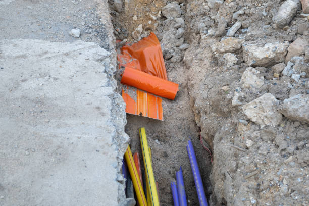 istock A lot of communication Cables protected in various color tubes. underground infrastructure installation. Construction site with electric and high-speed Internet Network cables are buried 1488005383