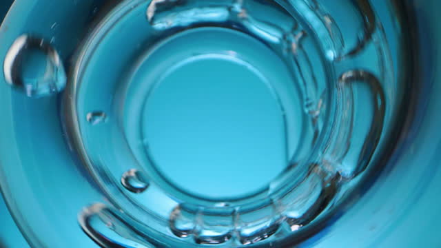 Slow motion liquid flowing in spiral tube