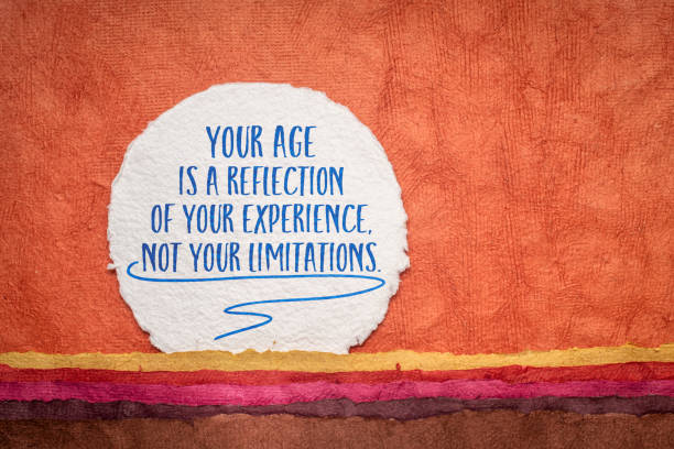 istock Your age is a reflection of your experience, not your limitations. Inspirational handwriting on an art paper. 1488009074