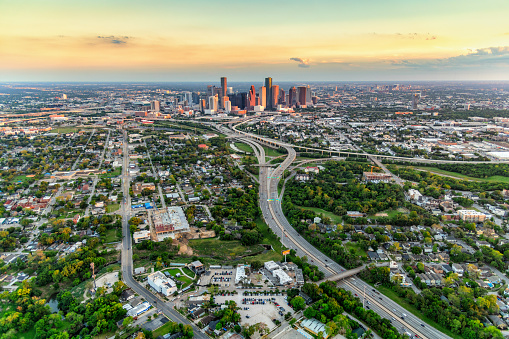 Skyline and surrounding commmunities of Houston, Texas at sunset on an early spring evening shot from an altitude of about 800 feet during a helicopter photo flight.