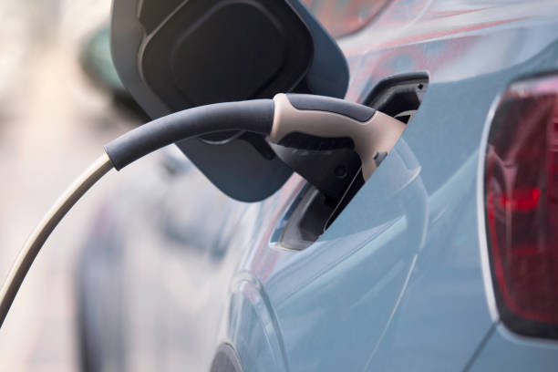 istock Electric car at a charging station 1488016090