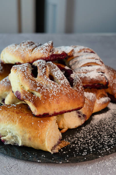 istock Rustic Plate of Blueberry-Filled Sweet Buns 1488016978