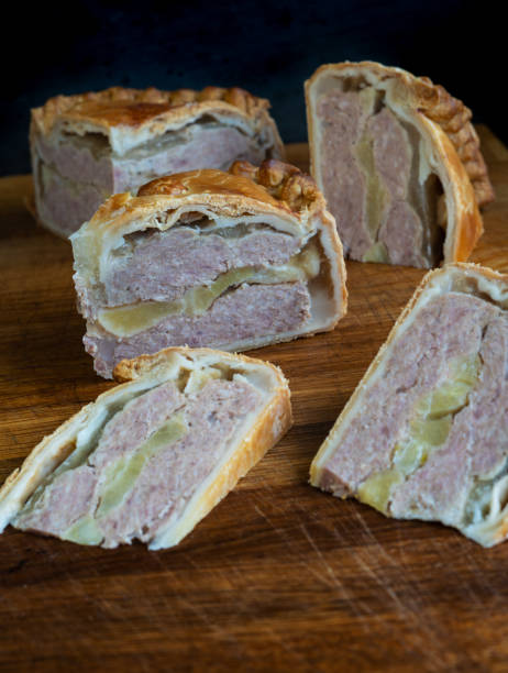 istock Savory Slices ofPork Delights on Rustic Wooden Table clouse up 1488017821