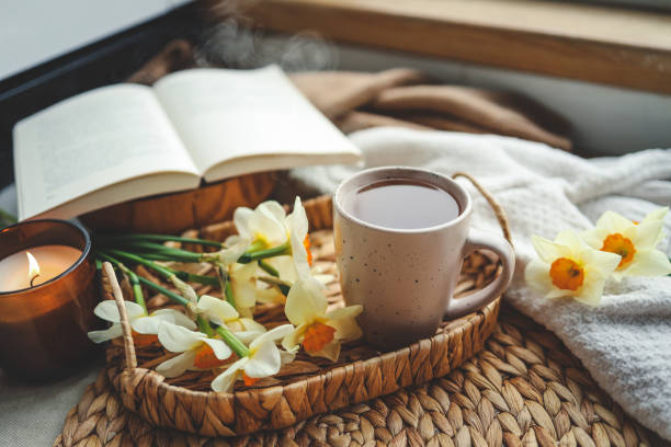 istock Cup of hot tea and spring home interior. good morning concept 1488024403