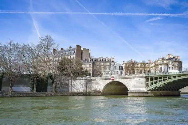 Paris, view of the Sully bridge on the ile de la Cite, beautiful buildings