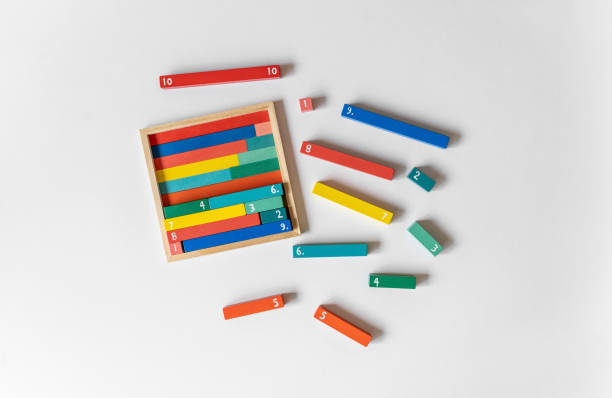 Math fractions on white background. Interesting math for kids. Education, back to school concept. Geometry and mathematics materials. Close up