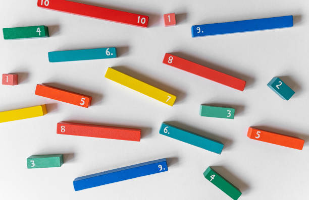 istock Math fractions on white background. Interesting math for kids. Education, back to school concept. Geometry and mathematics materials. Close up 1488026133