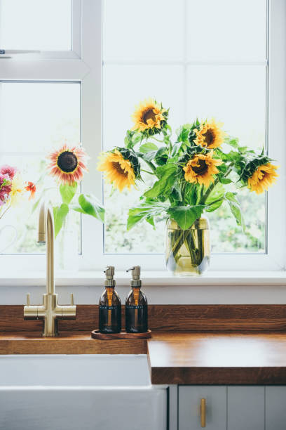 istock Sunflowers in vase in a modern kitchen 1488027422