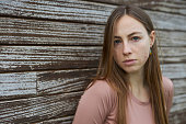 portrait photo of a blonde lady with pimples