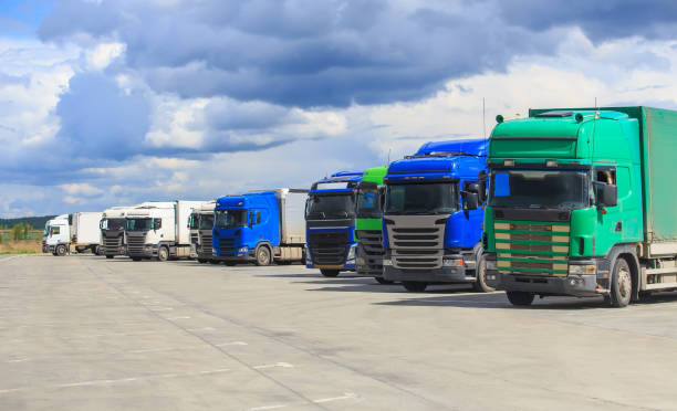 istock Big trucks in a parking lot 1488033154