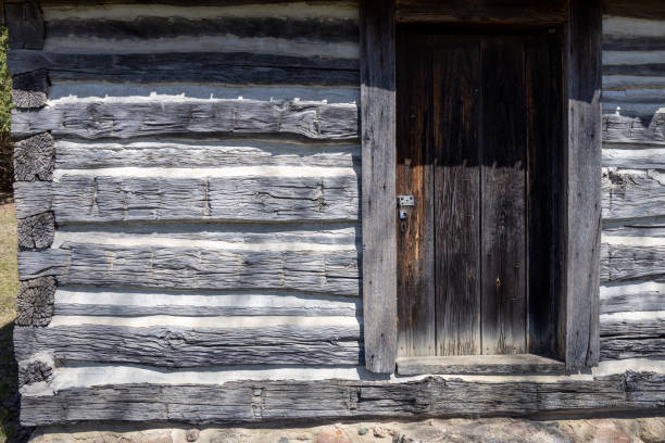 istock 19th century log cabin exterior with boarded window 1488035238