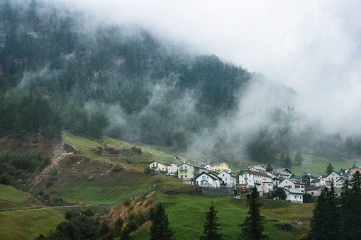 switzerland mountain village in fog