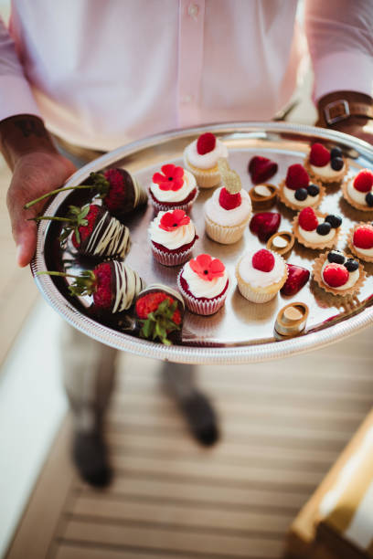 istock Server with a tray of desserts 1488040294