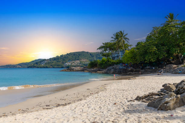 istock Patong Beach Phuket Thailand nice white sandy beach clear blue and turquoise waters and lovely blue skies with Palms tree sunset sunrise 1488052504