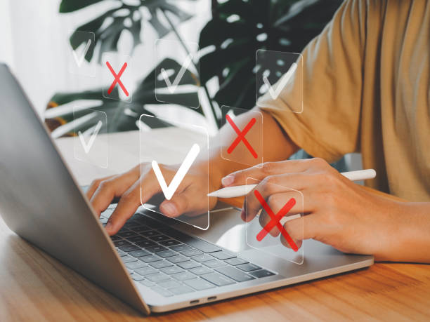 istock Selection of answer marks for approval and rejection. 1488057290