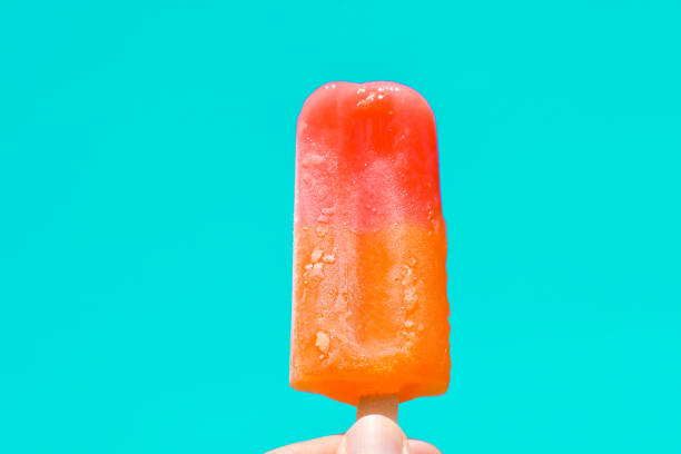 istock Ice cream in hand with copy space for text. summer background concept 1488058927