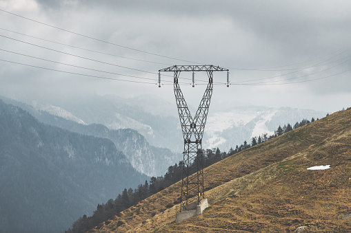 A high-tension transpose pylon in the mountains
