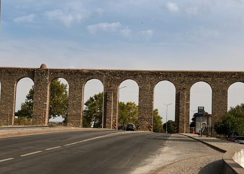 Evora, Portugal- October 10, 2022: The Agua de Prata Aqueduct in the old town of Evora
